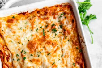 An overhead birds-eye view of a pan of baked spaghetti.