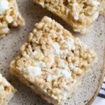 Pumpkin Spice Krispie Treats on a plate from above showing gooey marshmallow