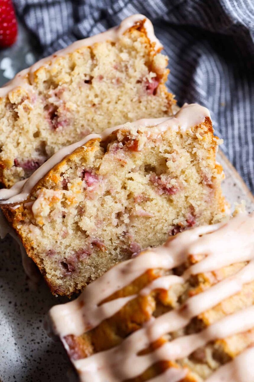 Slices of strawberry bread cut from the end of a loaf, resting on their sides.