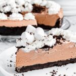 Oreo crust no bake pie on a plate.