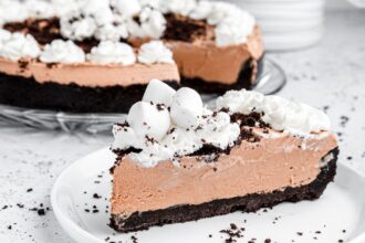 Oreo crust no bake pie on a plate.