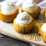 mini cheesecakes on a stoneware plate