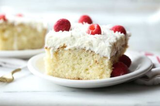 Coconut Poke Cake - Cookies and Cups