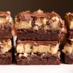 Fudge Brownies topped with raw cookie dough and chocolate ganache