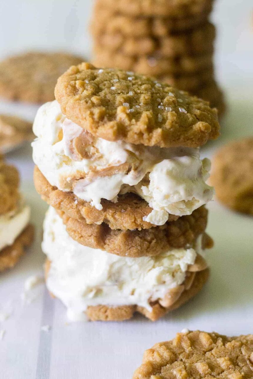 Calling all peanut butter lovers! These easy peanut butter cookie ice cream sandwiches are made with flourless peanut butter cookies and homemade peanut butter swirl ice cream. This is the ultimate summer dessert!