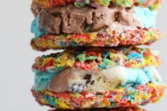 A stack of Fruity Pebble ice cream sandwiches on a plate