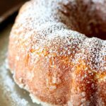 Kentucky Butter Cake on a platter dusted with powdered sugar