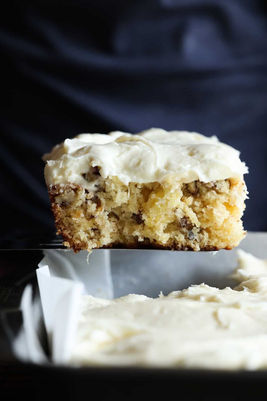 A slice of pineapple cake on a metal spatula