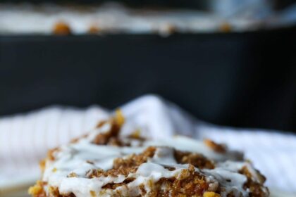 A slice of Pumpkin Cinnamon Roll Cake on a plate