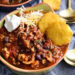 Turkey chili with sour cream and cheese.