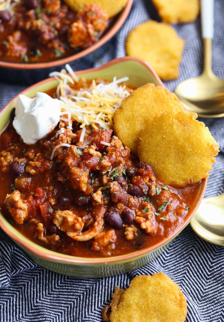 Turkey chili with sour cream and cheese.