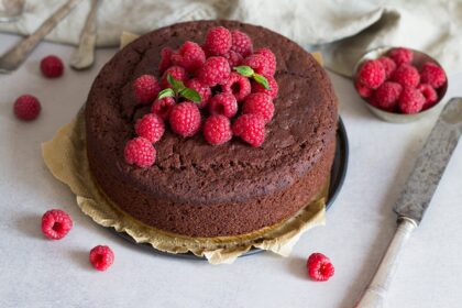 Vegan Gluten-Free Chocolate Sponge Cake Topped with Raspberries