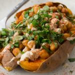 High Protein Chickpea-Stuffed Sweet Potatoes With Garlic Tahini Sauce [Vegan] – One Green Planet