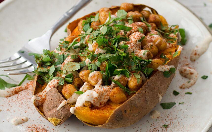 High Protein Chickpea-Stuffed Sweet Potatoes With Garlic Tahini Sauce [Vegan] – One Green Planet