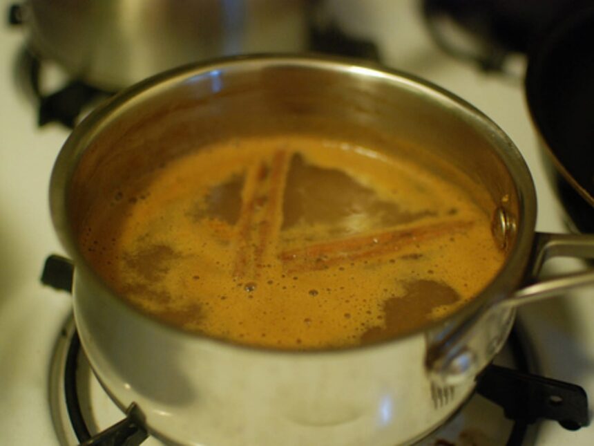 Hot apple cider with bourbon and spices