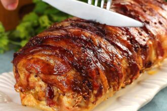 Surprise your guests at Christmas dinner! Juicy Stuffed Pork Loin in bacon.