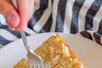 Tender Pineapple Cake with Fluffy Coconut Icing - get the recipe at barefeetinthekitchen.com