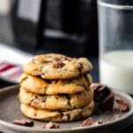 Chocolate chip air fryer cookies stacked on plate.