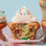 Photo showing the fluffy texture of the inside of our gluten-free funfetti cupcakes