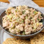 spicy tuna salad in a bowl with crackers
