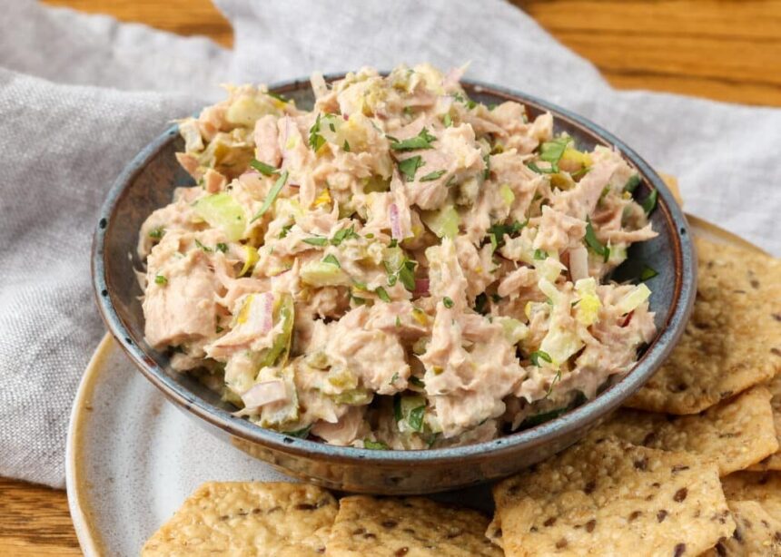 spicy tuna salad in a bowl with crackers