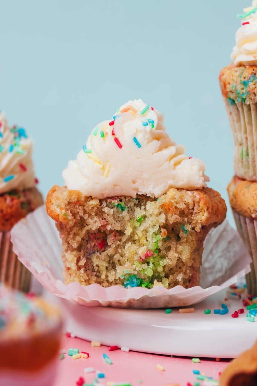 Photo showing the fluffy texture of the inside of our gluten-free funfetti cupcakes