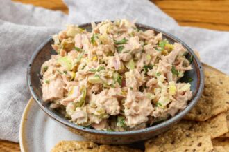 spicy tuna salad in a bowl with crackers