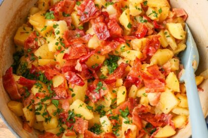 pot on stove with bacon and potatoes