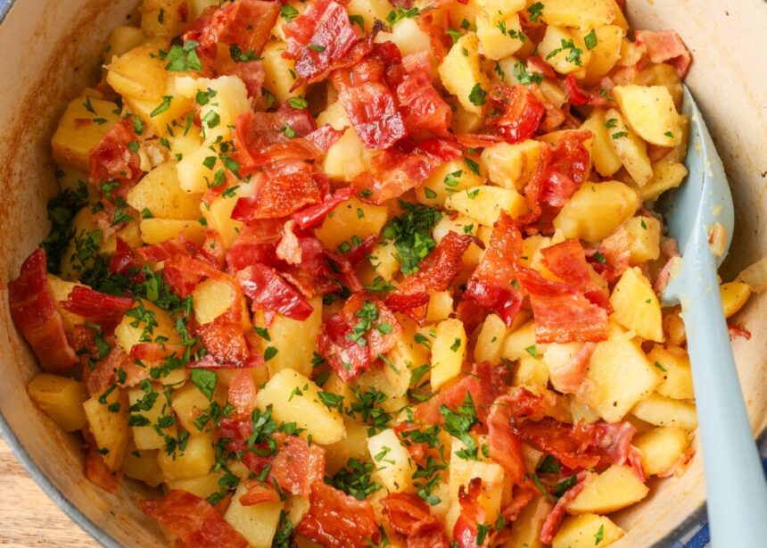 pot on stove with bacon and potatoes