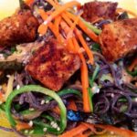 Pan-Fried Tofu With Zucchini, Carrot, and Black Bean Sesame Noodles [Vegan] – One Green Planet