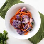 Purple Cauliflower Thai Green Coconut Curry With Carrot Noodles [Vegan] – One Green Planet