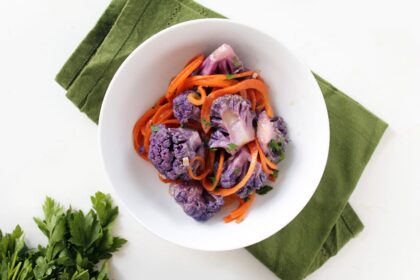Purple Cauliflower Thai Green Coconut Curry With Carrot Noodles [Vegan] – One Green Planet
