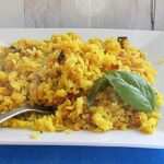 Indian Flattened Rice Flakes Cooked with Veggies and Nuts [Vegan] – One Green Planet