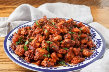 A horizontally aligned photo of a plate full of crispy, juicy southwest chicken bites.